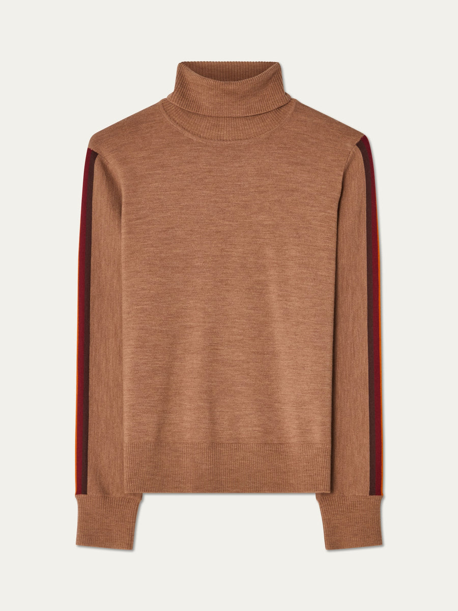 We Norwegians | FW25 | Womens Freebird Turtleneck Sweater_Cinnamon | A knitted turtleneck sweater with contrasting panels on the sleeves | Shot against an off-white background